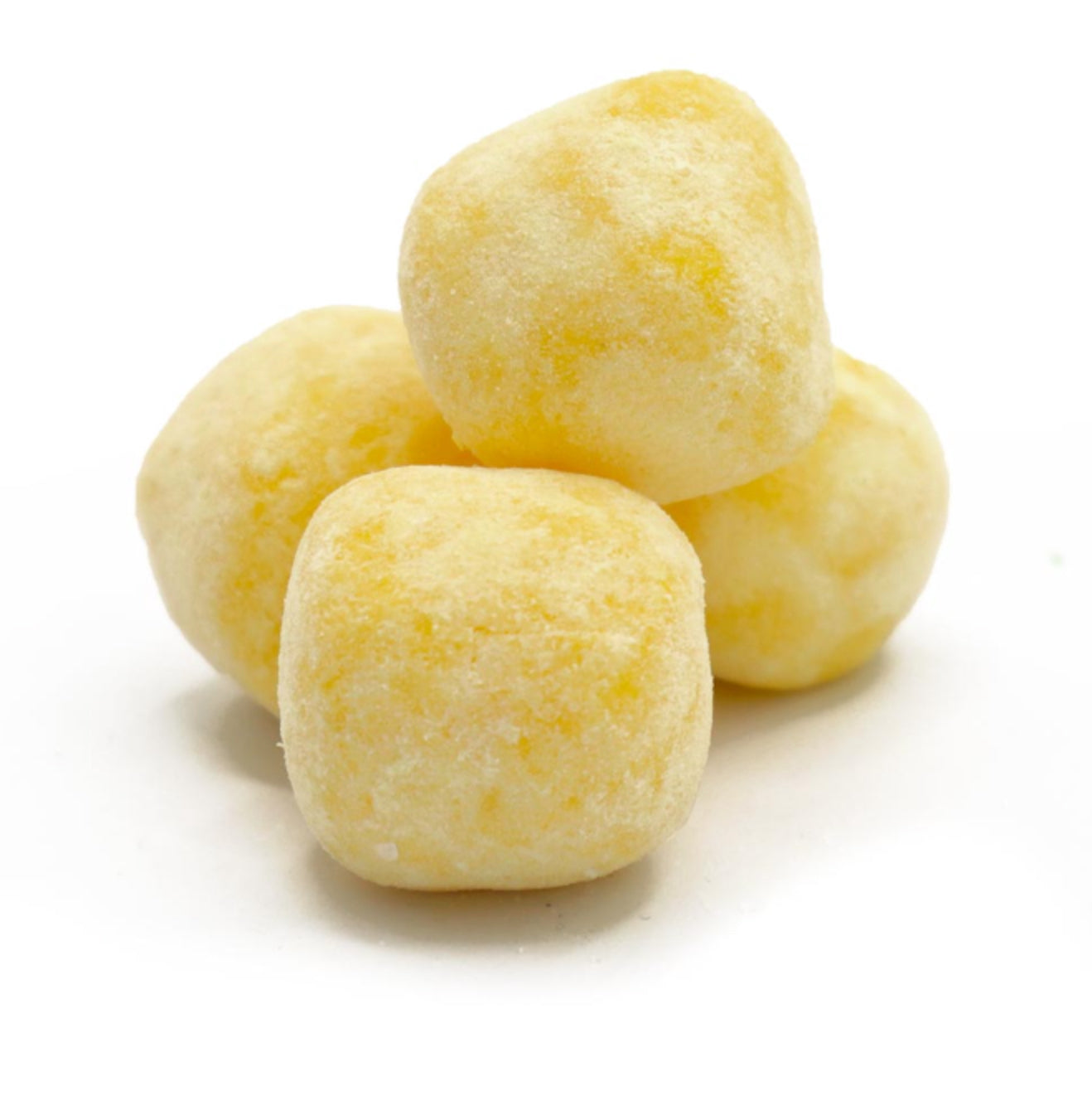 Four lemon bon bon sweets on a white background
