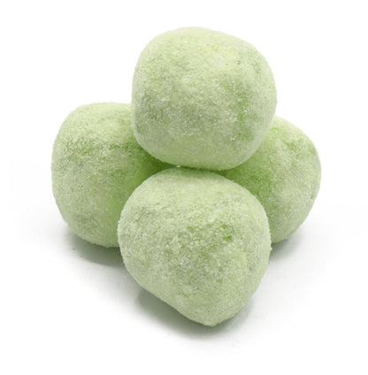 Four apple bon bon sweets on a white background