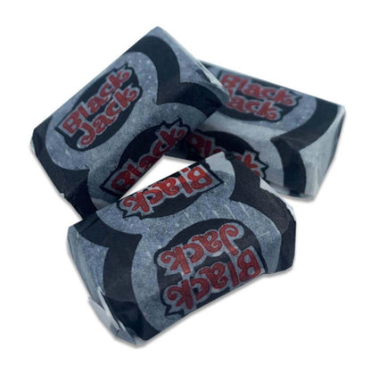 Three wrapped black jack sweets