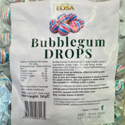 A close-up of a white product label for Eosa Bubblegum Drops, showing the brand name, product type, ingredients, nutritional information, and a barcode, with colorful bubblegum packaging visible in the background.