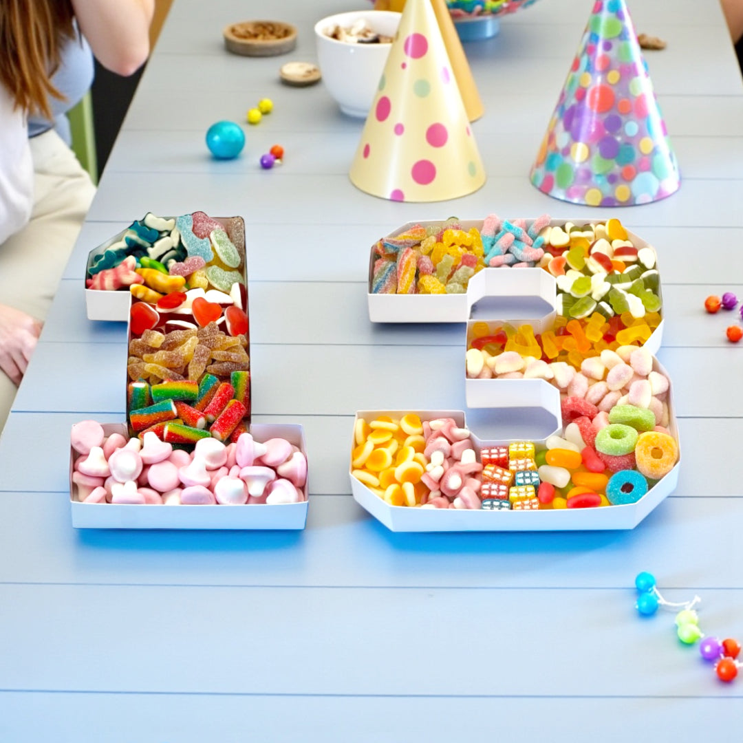 Lollypop Lane Birthday or Any Occasion Numbers Filled With Sweets on a party table