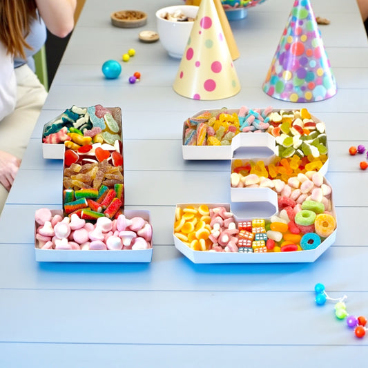 Lollypop Lane Birthday or Any Occasion Numbers Filled With Sweets on a party table