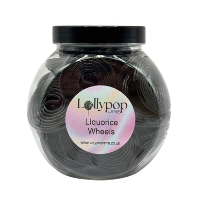 Lollypop Lane sweet jar filled with black liquorice wheels.