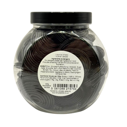 Lollypop Lane sweet jar filled with black liquorice wheels and aa label displaying the ingredients and nutritional values.