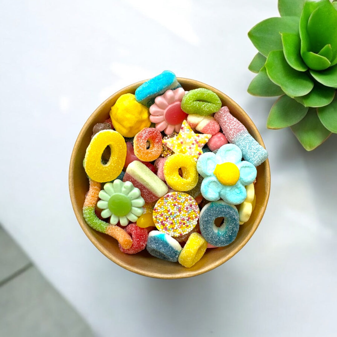 A food bowl filled with delicious spring coloured sweets
