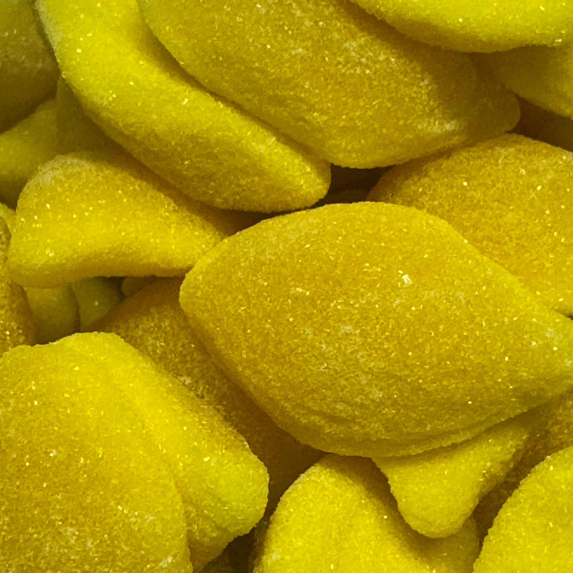 Chewy, fizzy, lemon-shaped Pick n Mix Sweets