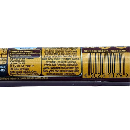 Close-up of a Nestle chocolate bar label with text and a barcode on a white background.