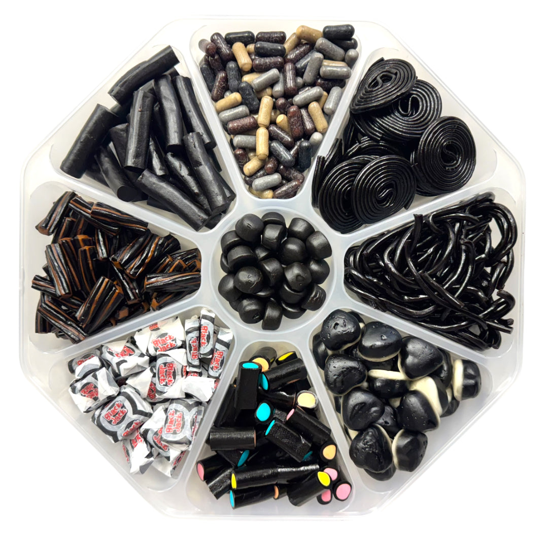Lollypop Lane sweet platter filled with an assortment of black liquorice sweets on a white background.