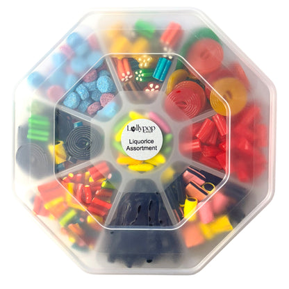 Lollypop Lane sweet platter (with the lid on) filled with an assortment of liquorice sweets on a white background.