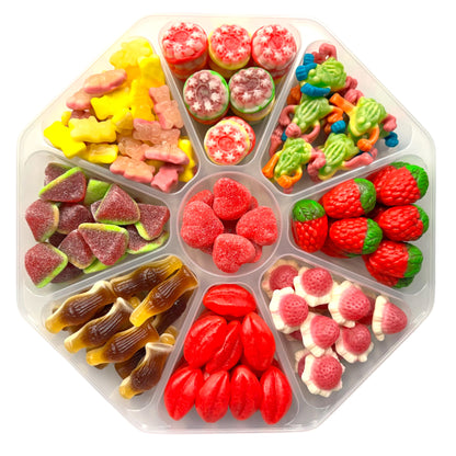 Lollypop Lane sweet platter filled with jelly filled sweets on a white table.