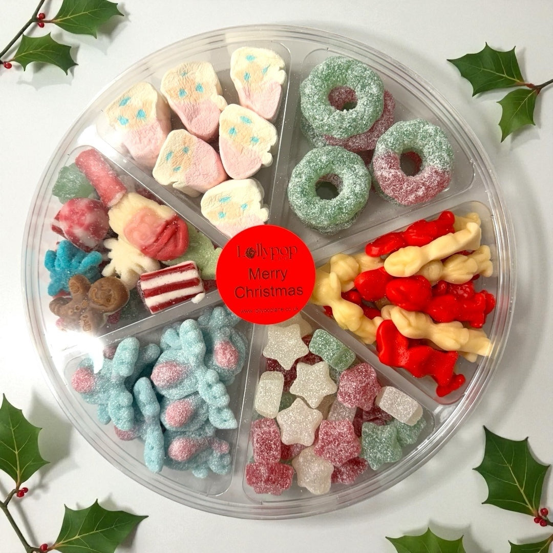 Lollypop Lane Mini Christmas Pick n Mix Sweet Platter 700g surrounded by hlly