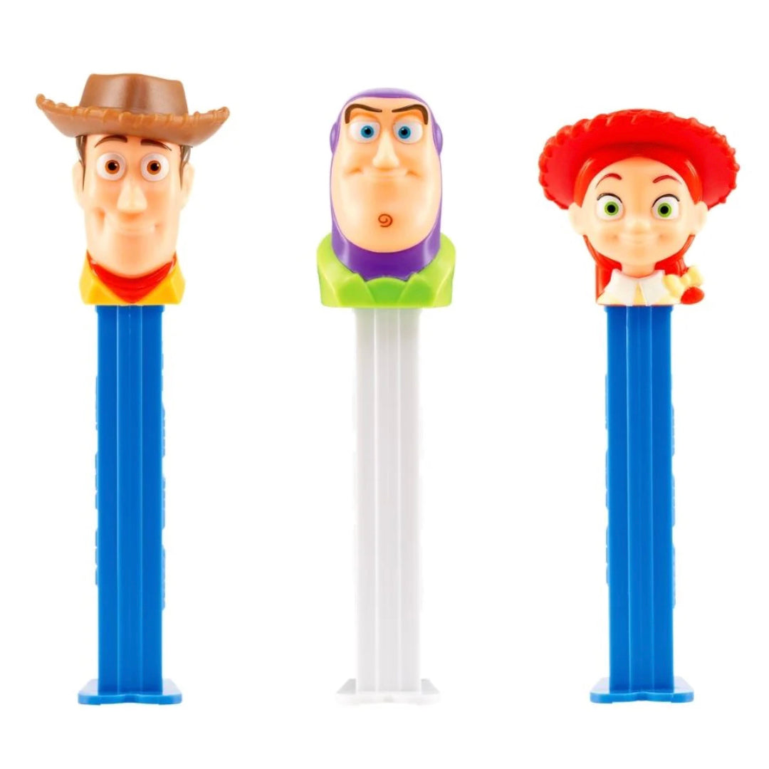 Three PEZ dispensers featuring characters from Toy Story on a white background