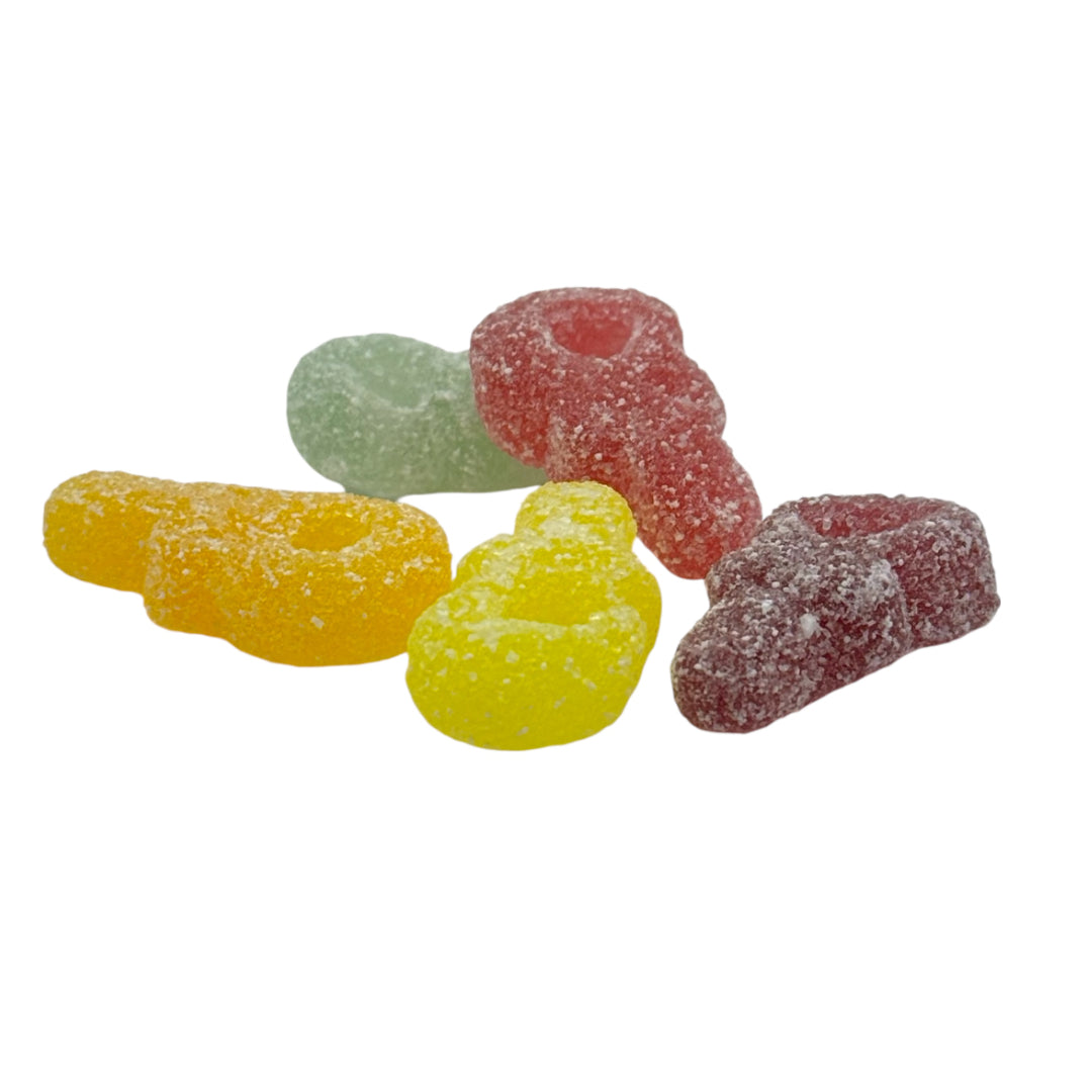 A selection of Candycrave Vegan Fizzy Dummies on a white background