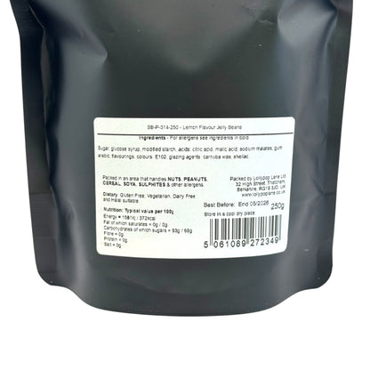 Back of a black packaging with a white label containing text and barcodes.