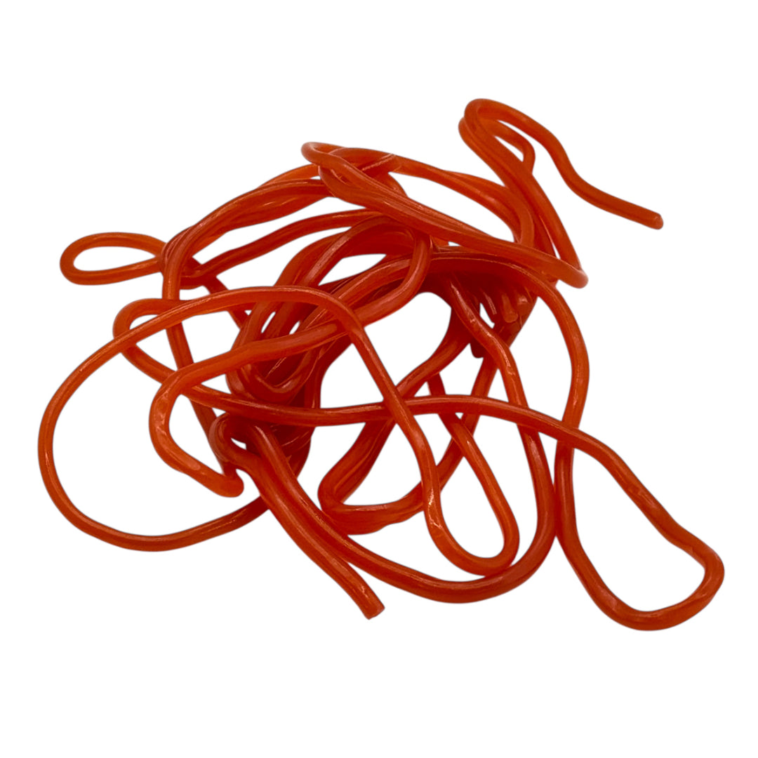 Strawberry flavoured sweet laces on a white background