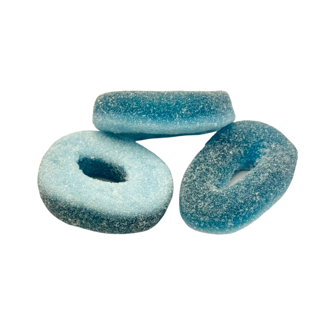 Three fizzy blue ring sweets on a white background.