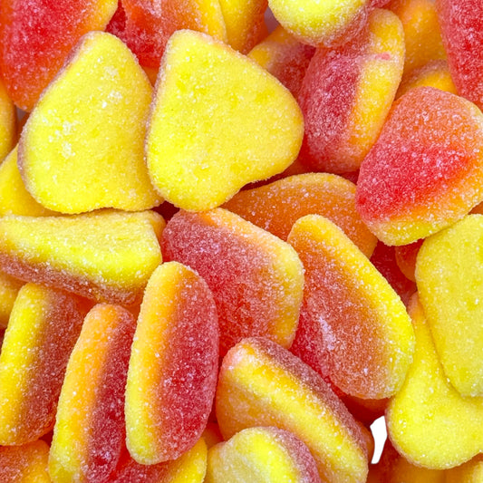 Close-up of Candycrave fizzy peach hearts 