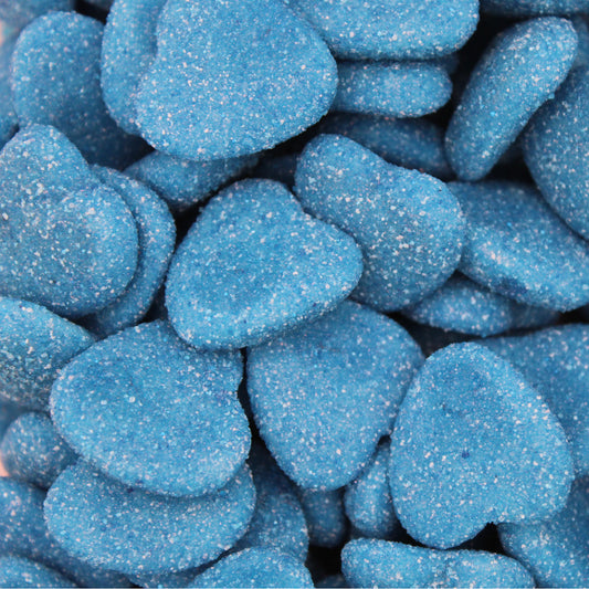 Close-up of blue heart-shaped candies with glittery texture
