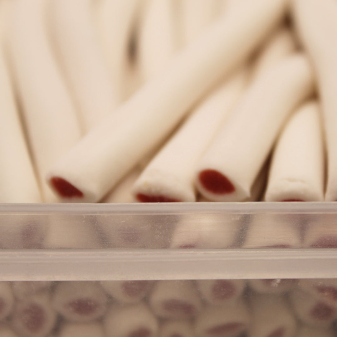 Close-up of Reverse Cream-Strawberry Pencils