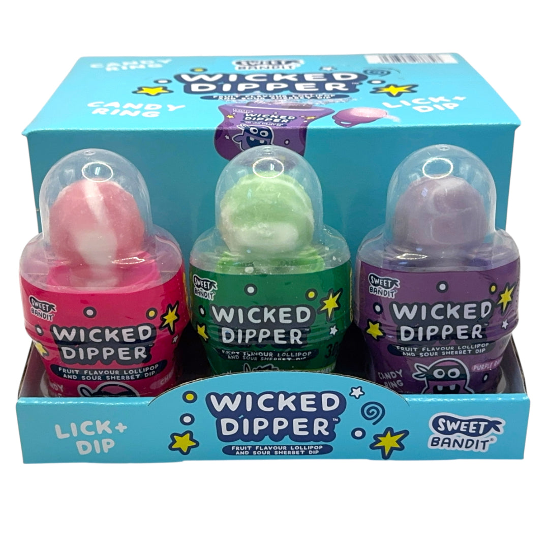Three Wicked Dipper lollipop containers in a display box with colorful packaging.