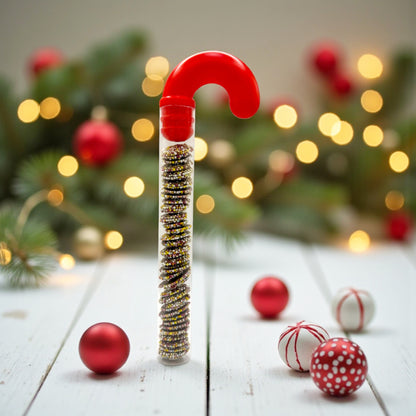 Lollypop Lane Candy Cane filled with Milk Chocolate Jazzies. The background features a Christmas decorated table.